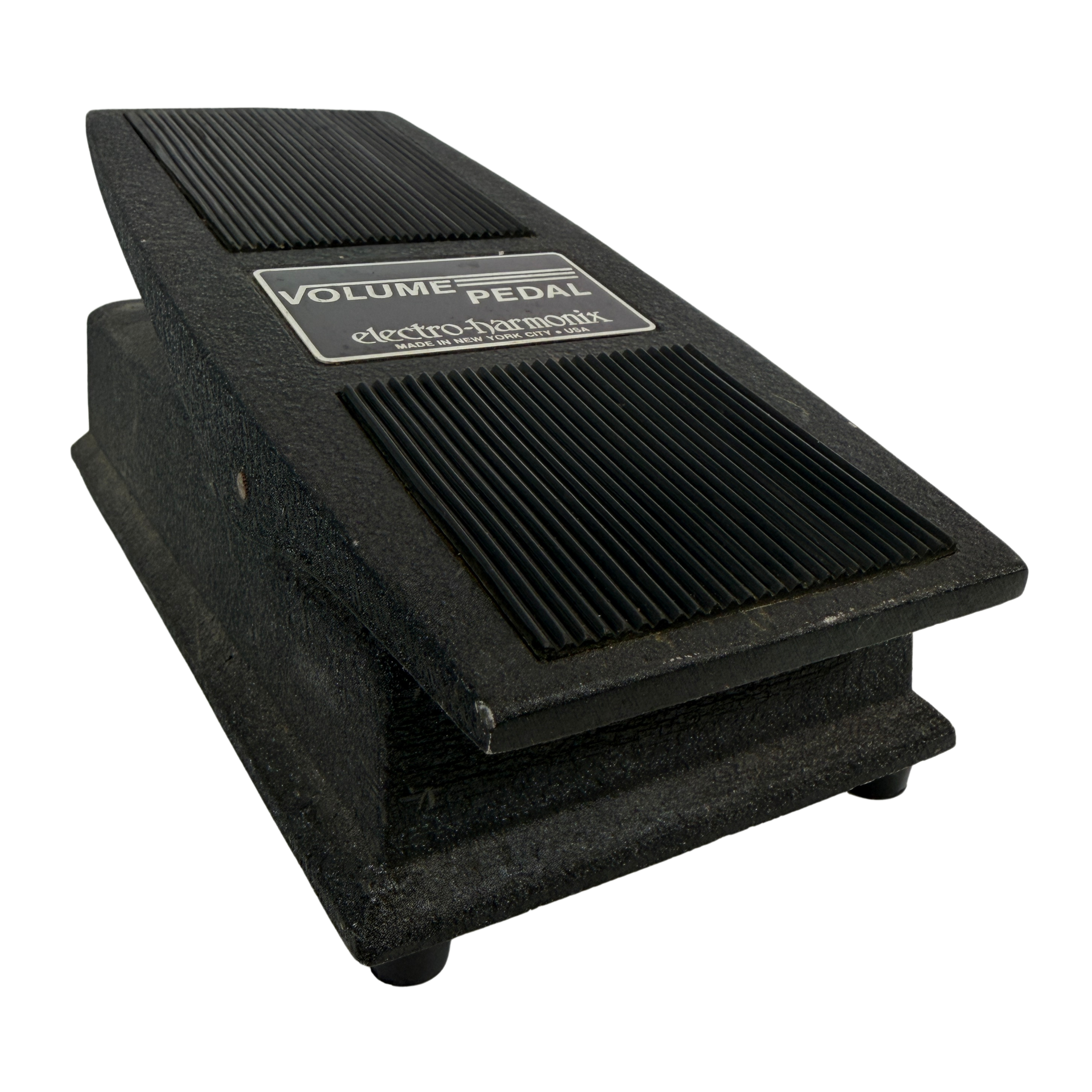 A black Electro-Harmonix Volume Pedal electric guitar effect pedal, photographed at an angle on a solid white background.