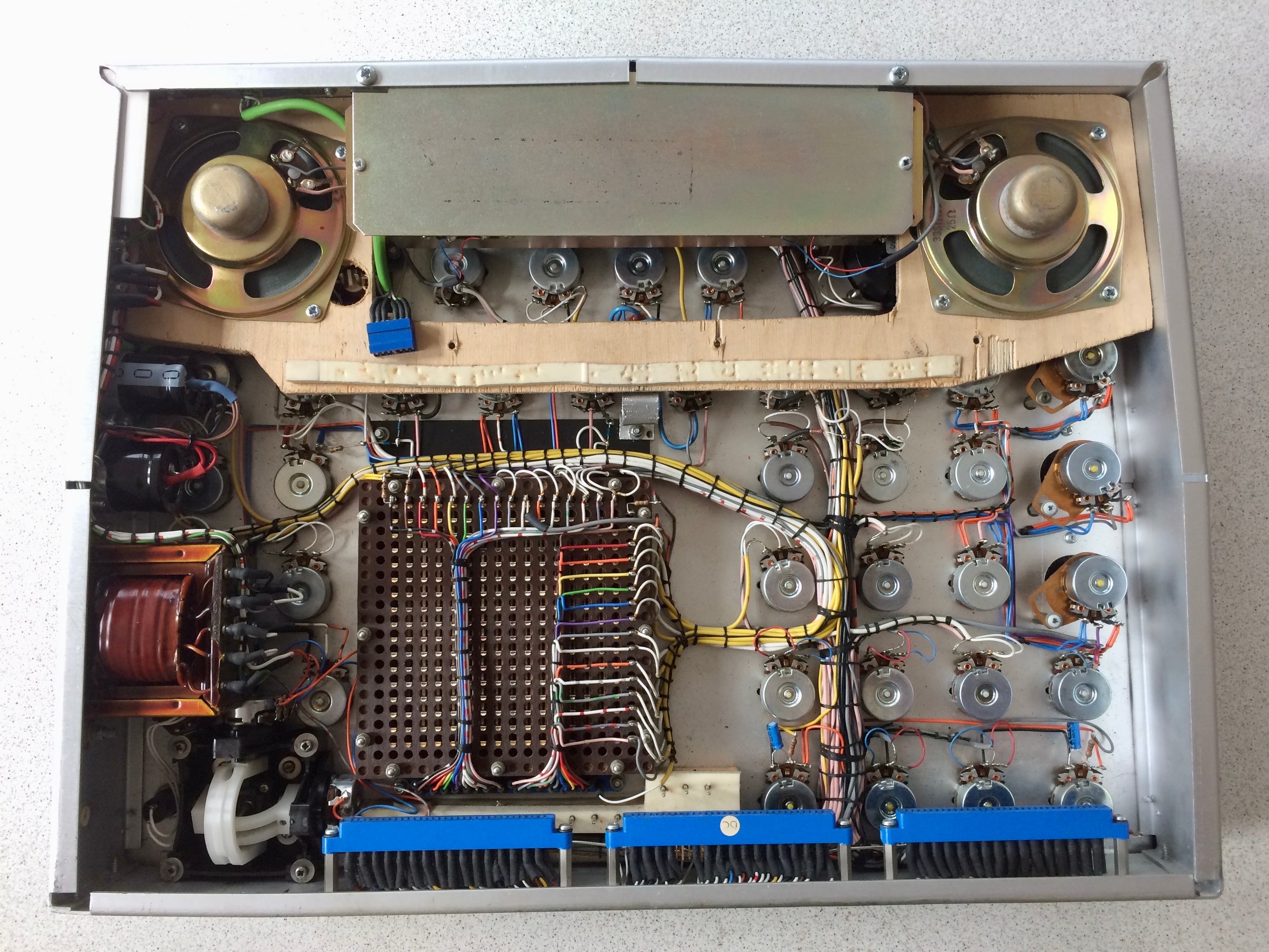 Electrical component with various wires and components on a white background