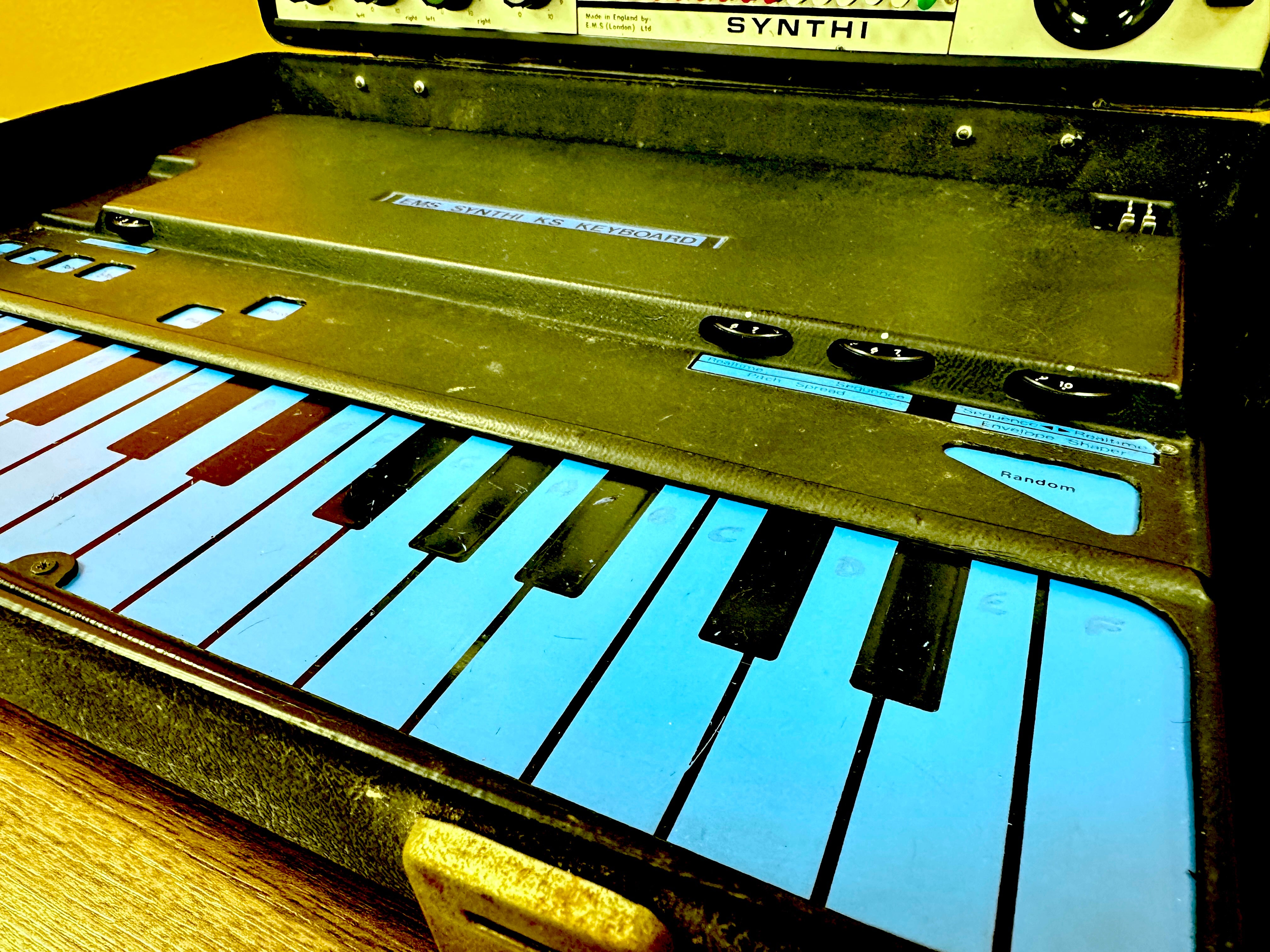 Vintage synthesizer with keyboard and control panel