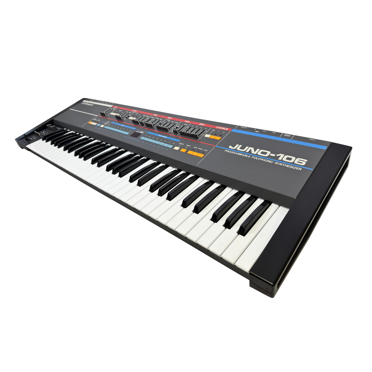 A Juno-106 analog synthesizer keyboard shown at an angle on a plain white background.
