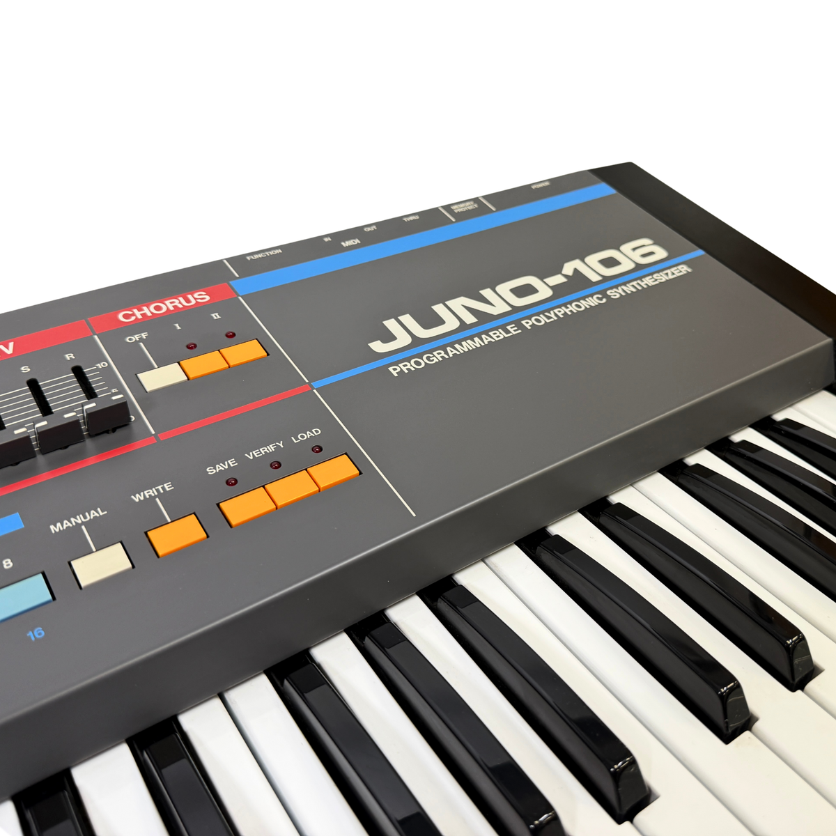 Close-up of a Juno-106 programmable synthesizer keyboard showing the gray control panel with blue and red accents, white and black keys, and the Juno-108 branding.