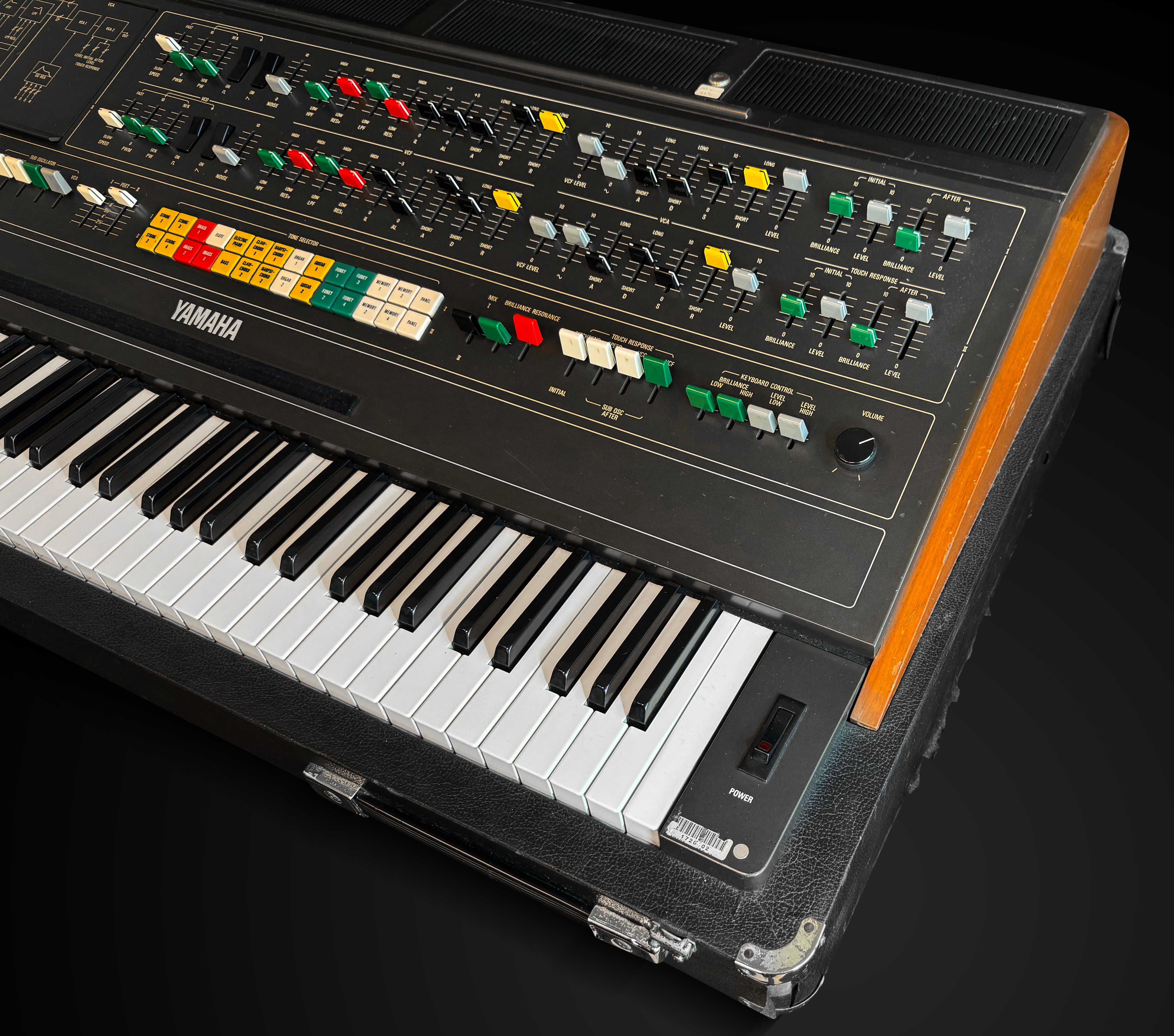 Yamaha keyboard with control panel on a black background